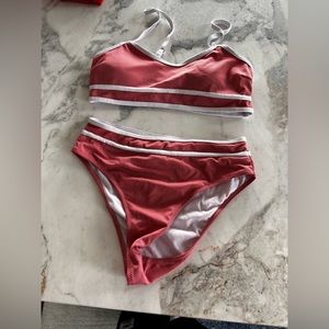 Swimming suit lot of 3 never worn.
